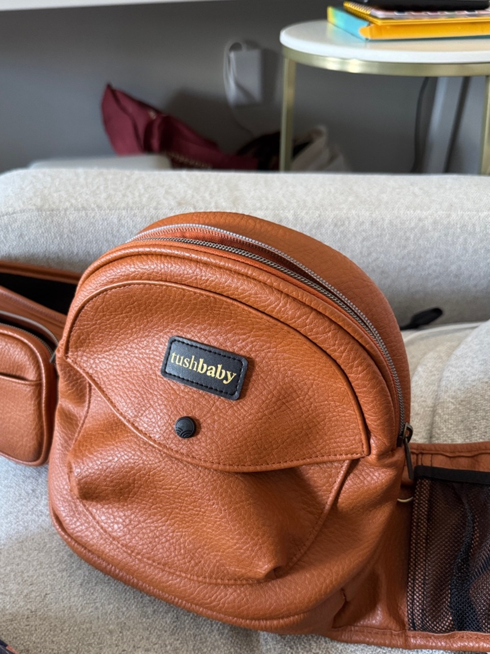TushBaby Tan Leather Baby Bag - Compact Hands-Free Organizer